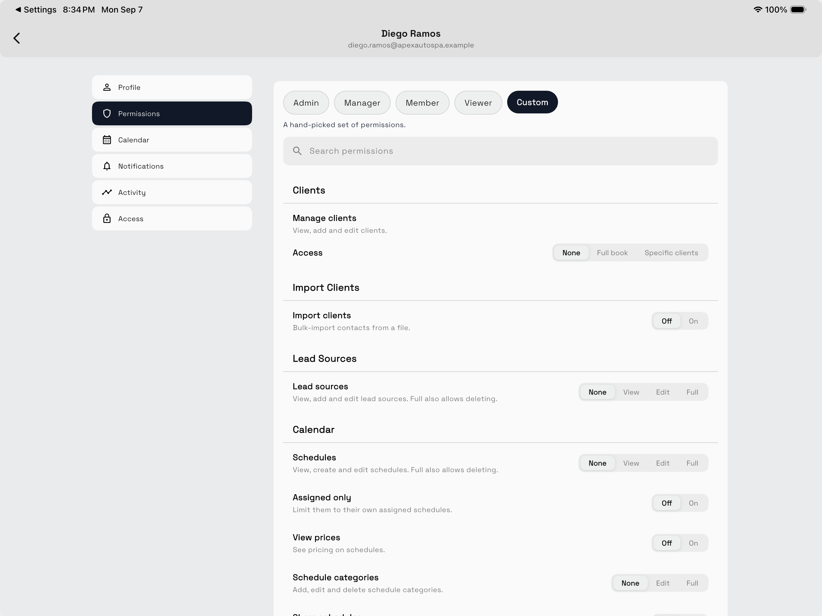 Workspace369 team member permissions editor showing the Admin, Manager, Member, Viewer, and Custom role presets, a permission search field, and the Clients controls for viewing, editing, and limiting access to the full book or specific clients